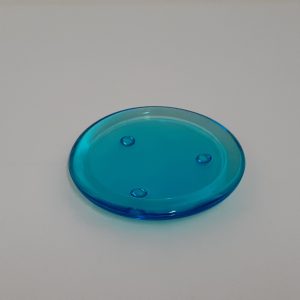 Blue glass plate candle holder
